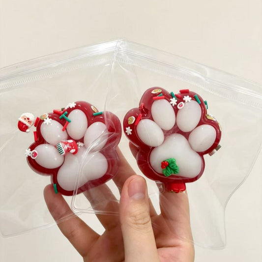 Christmas Paw-Shaped Squishy Toy โ TPR Stress Relief Fidget Toy with Festive Holiday Decorations