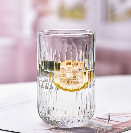 Vintage Embossed Glass Goblet with Elegant Stemmed Base