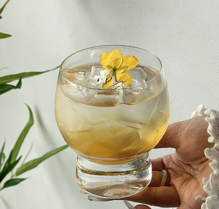 Modern Round Glass Cup with Raised Pedestal Base