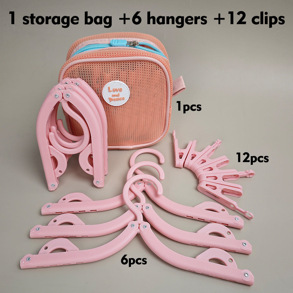 Foldable Travel Hanger Set – 6 Hangers, 12 Clips & Storage Bag