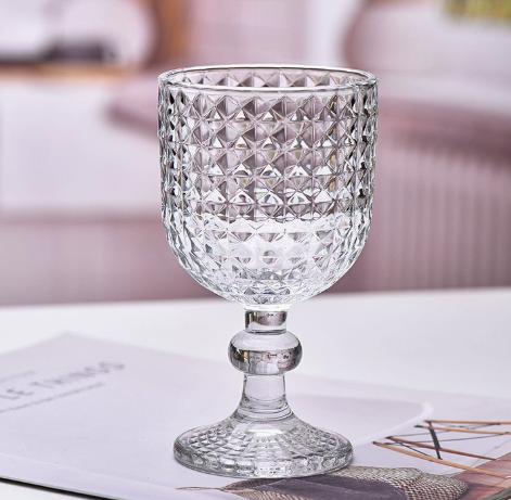 Vintage Embossed Glass Goblet with Elegant Stemmed Base